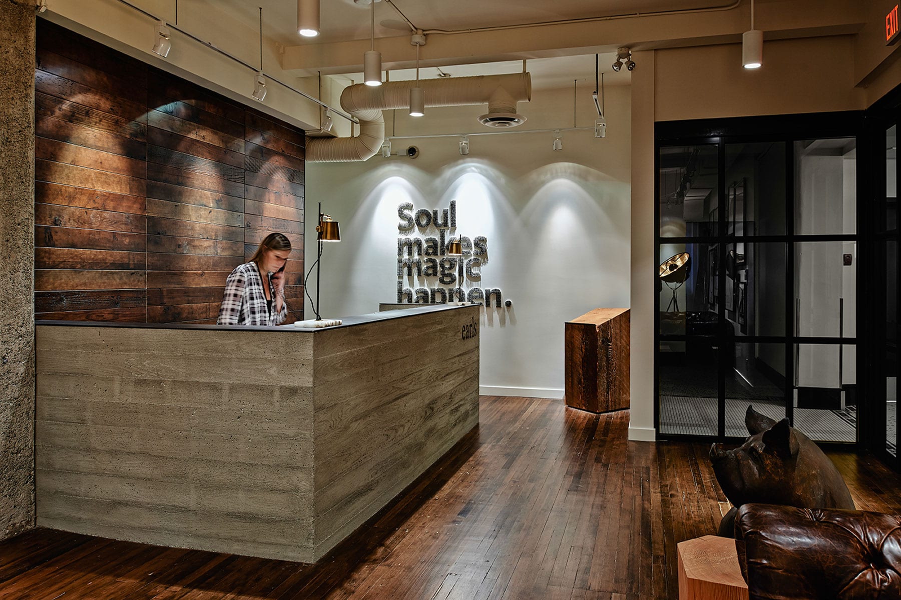 earls vancouver head office reception area with signage: soul makes magic happen